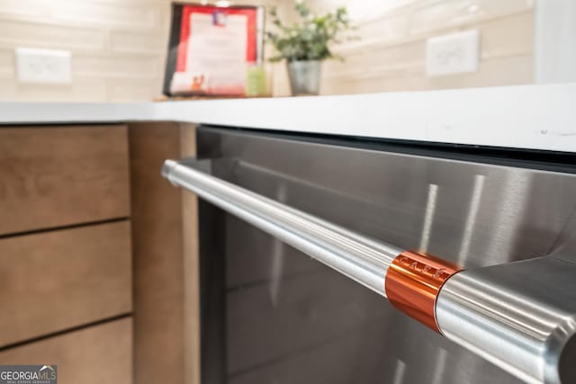 interior details featuring stainless steel dishwasher