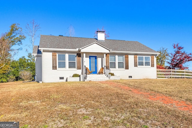 view of front of house featuring a front lawn