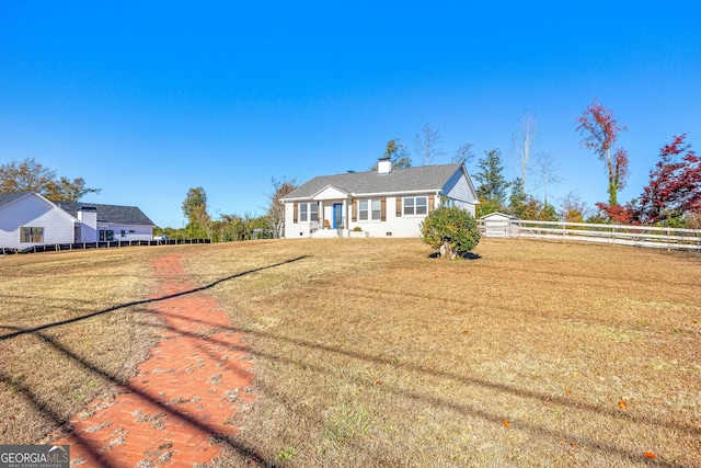 view of front of property with a front yard