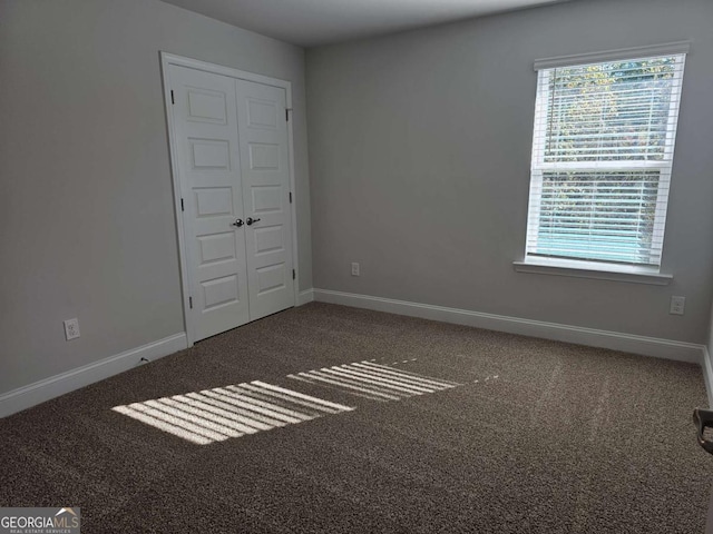 interior space featuring baseboards