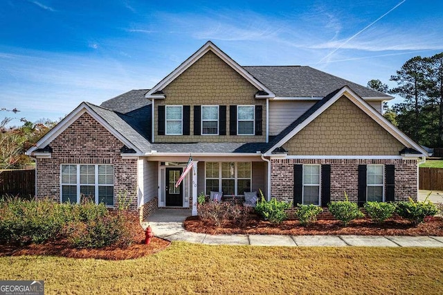 view of front of property with a front lawn