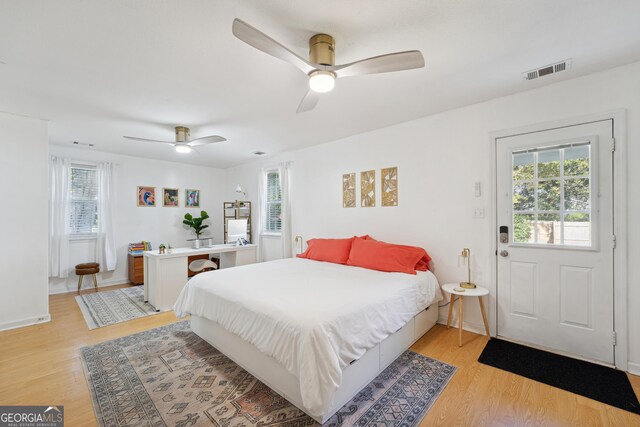 bedroom featuring ceiling fan and light hardwood / wood-style flooring