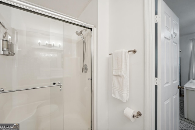 bathroom with an enclosed shower