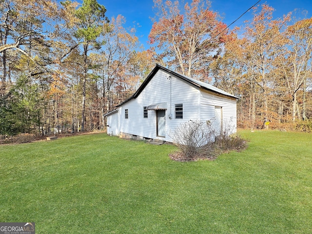 view of property exterior featuring a yard