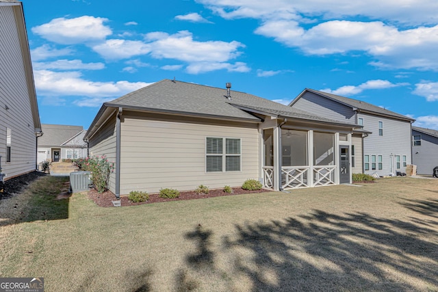 4336 Rockrose Green Way, Gainesville, GA 30504 - rear view of house featuring a yard, a sunroom, and a shingled roof