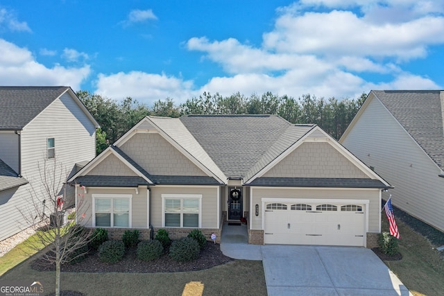 4336 Rockrose Green Way, Gainesville, GA 30504 - craftsman-style house with a garage, concrete driveway, brick siding, and roof with shingles