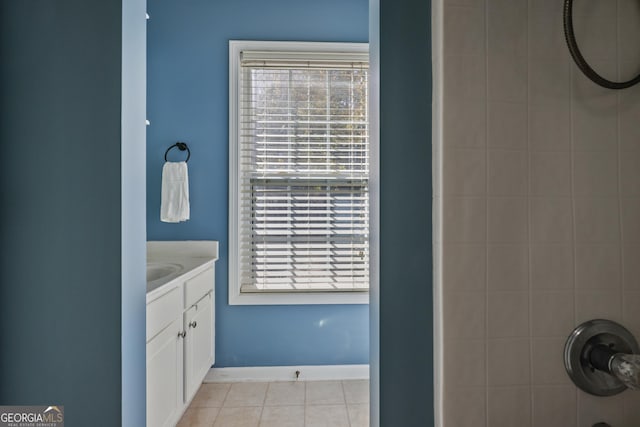 260 Wildcat Lake Dr, Lawrenceville, GA 30043 - full bath featuring a shower, tile patterned flooring, and vanity