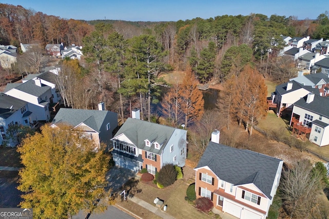 260 Wildcat Lake Dr, Lawrenceville, GA 30043 - aerial perspective of suburban area featuring a heavily wooded area
