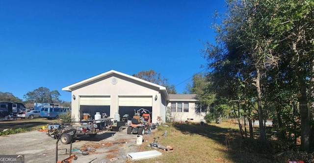 exterior space with a garage