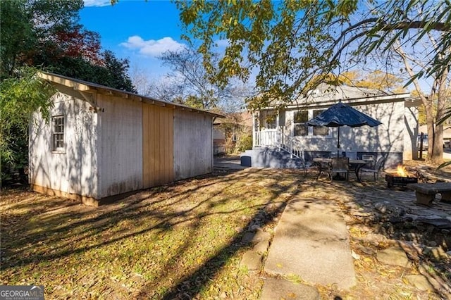 exterior space featuring a storage shed