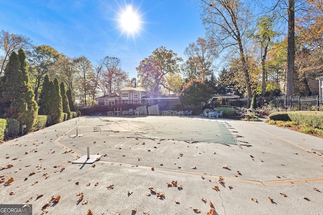 exterior space with a patio and a community pool