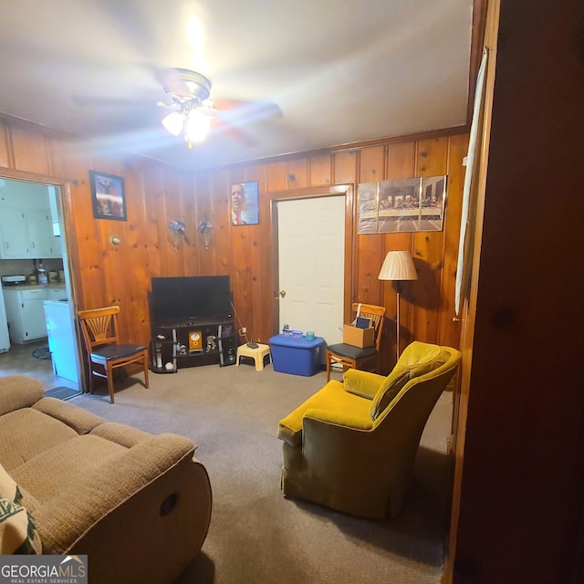 2045 Howe Ave, Columbus, GA 31903 - carpeted living area featuring a ceiling fan and wood walls