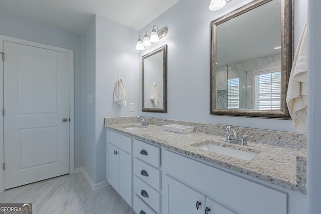 bathroom with vanity and walk in shower