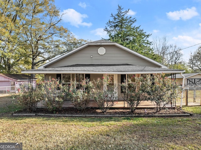 farmhouse-style home with a front yard