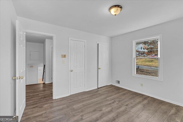 unfurnished bedroom featuring light hardwood / wood-style flooring