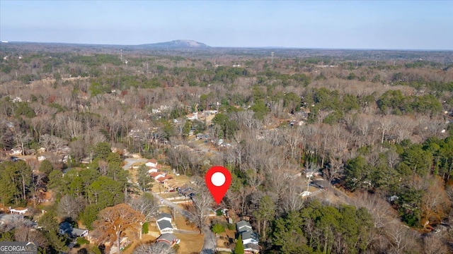 drone / aerial view featuring a mountain view