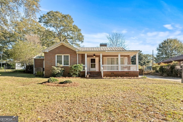 view of front of house with a front yard and a porch