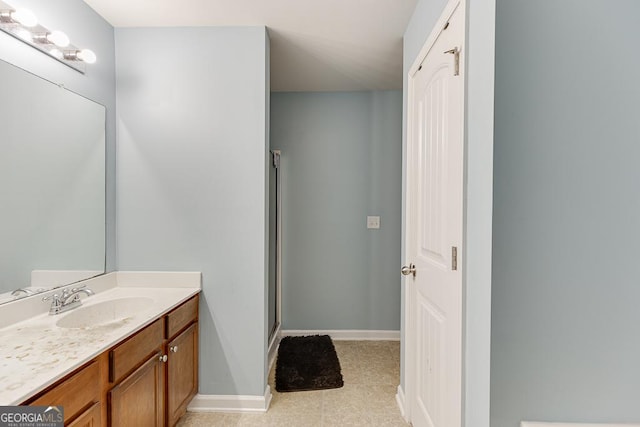 bathroom featuring vanity and walk in shower