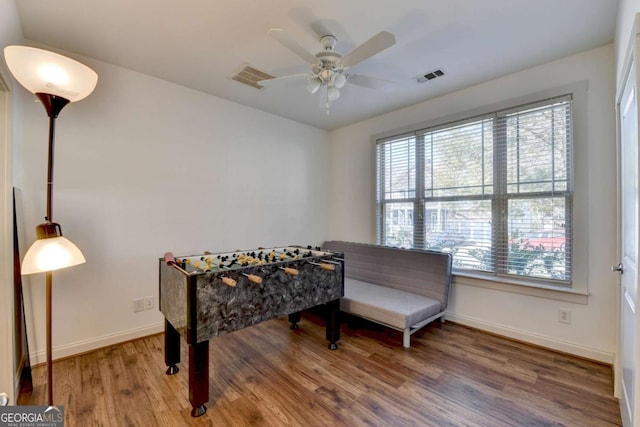 game room featuring ceiling fan and wood-type flooring