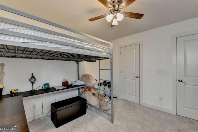 bedroom with light carpet and ceiling fan