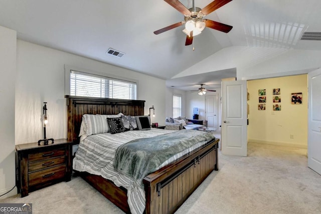 carpeted bedroom featuring vaulted ceiling and ceiling fan