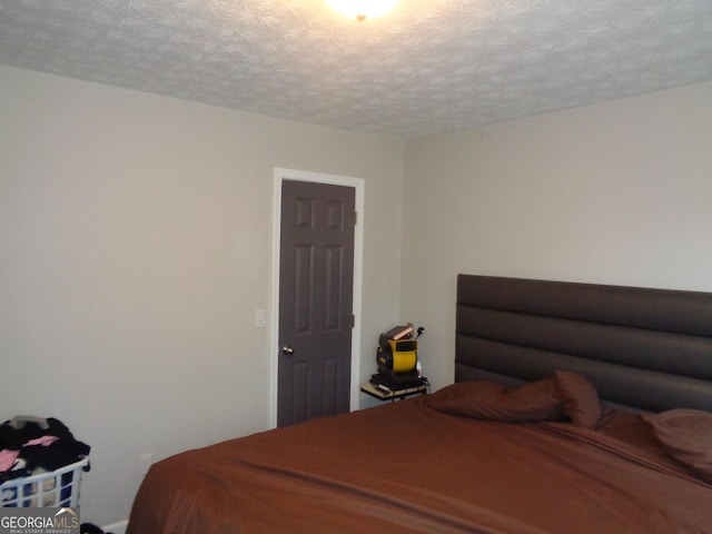 bedroom with a textured ceiling