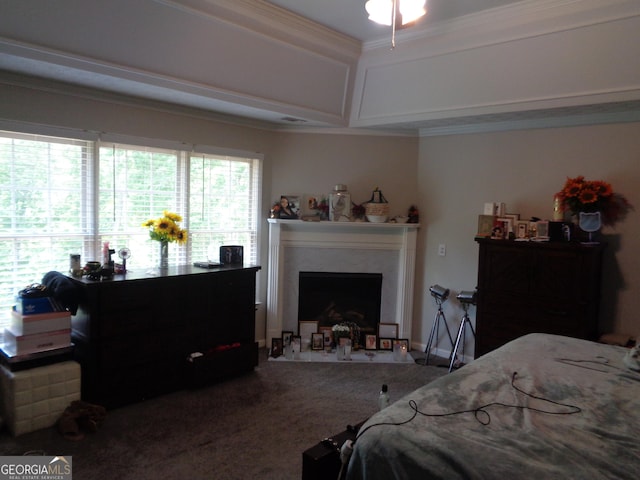 carpeted bedroom with ornamental molding