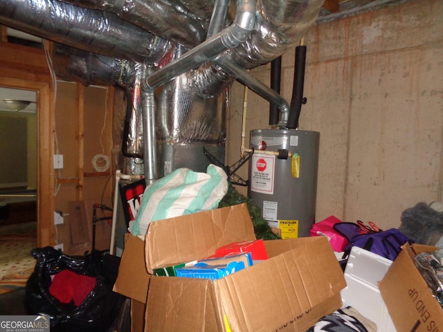 utility room featuring gas water heater