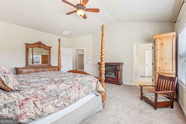 bedroom featuring light colored carpet, ceiling fan, and lofted ceiling