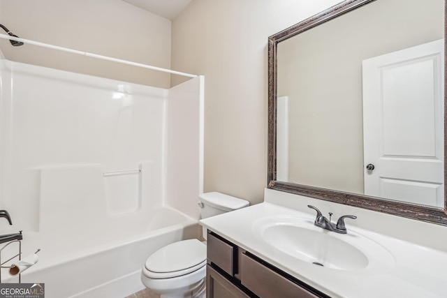 full bathroom featuring vanity, tub / shower combination, and toilet