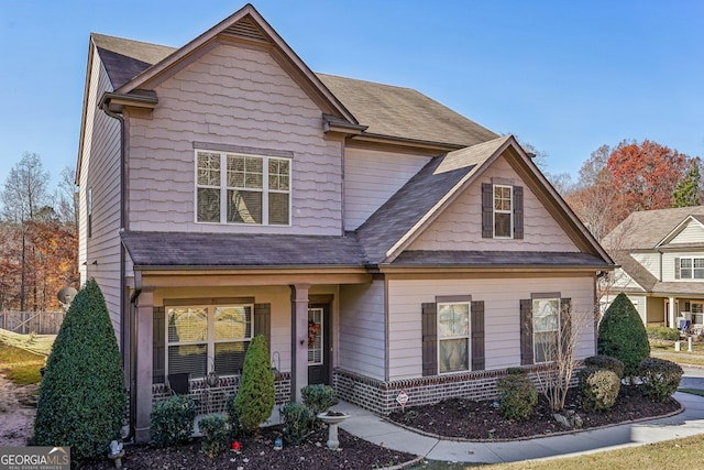 craftsman-style house featuring covered porch