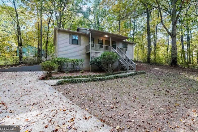 view of property with a porch