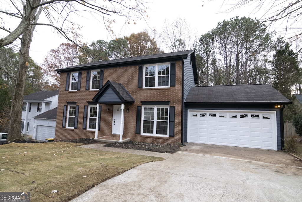 colonial-style house with a garage