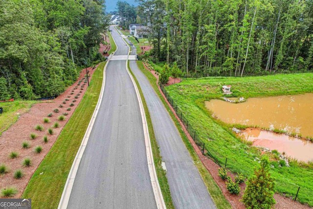 view of road featuring a water view