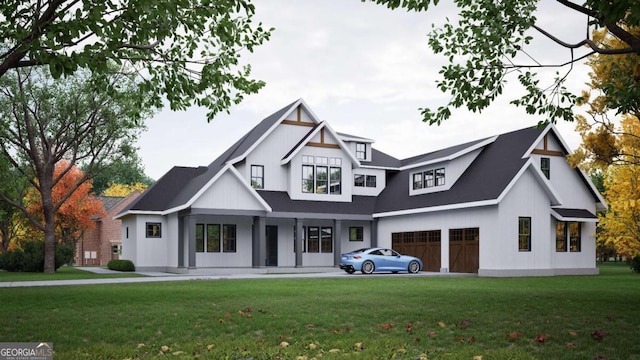 back of property featuring a yard, covered porch, and a garage