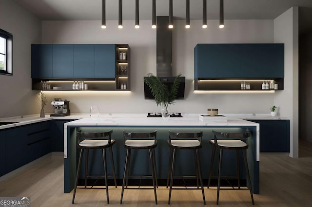 bar with blue cabinetry, pendant lighting, light hardwood / wood-style flooring, and light stone counters