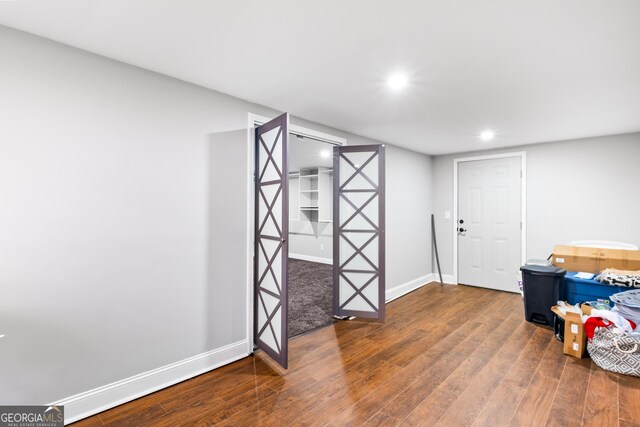 interior space featuring dark wood-type flooring
