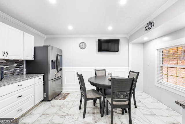 dining room with ornamental molding