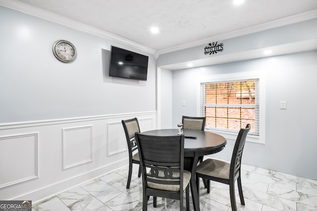 dining area with ornamental molding
