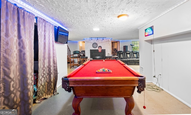 recreation room featuring a textured ceiling and pool table