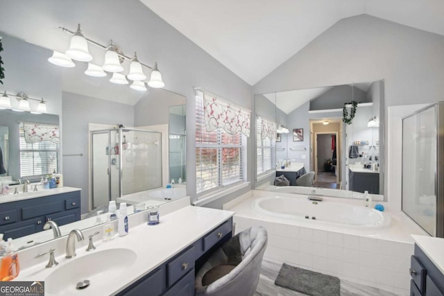 bathroom with a chandelier, vanity, independent shower and bath, and lofted ceiling