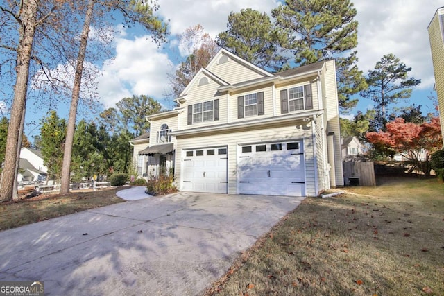 front of property with a garage