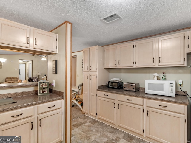 kitchen with a textured ceiling