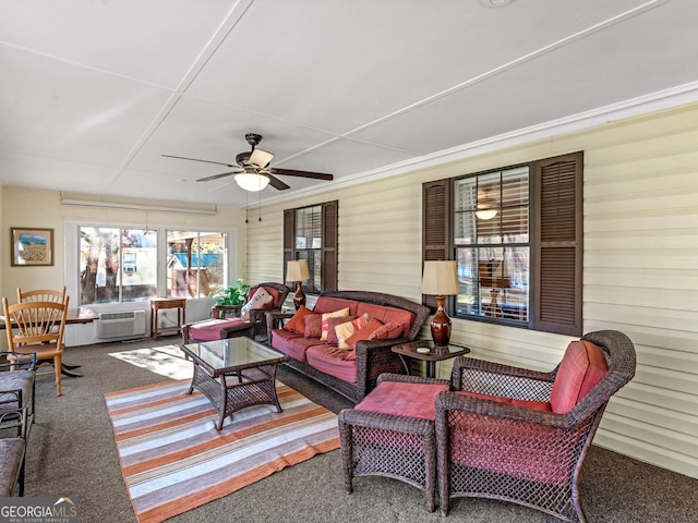 sunroom featuring ceiling fan