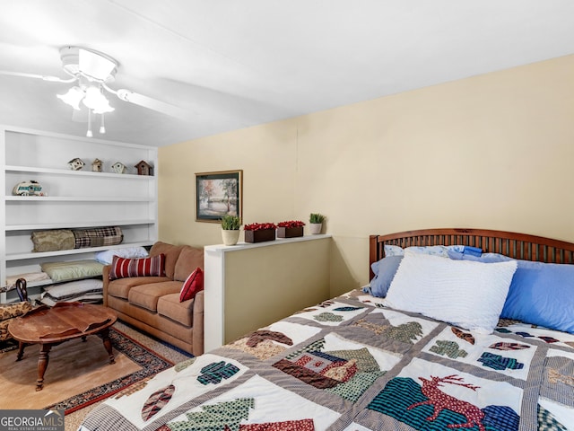 bedroom featuring ceiling fan and wood-type flooring