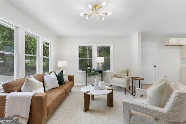 living room with a wealth of natural light and an inviting chandelier