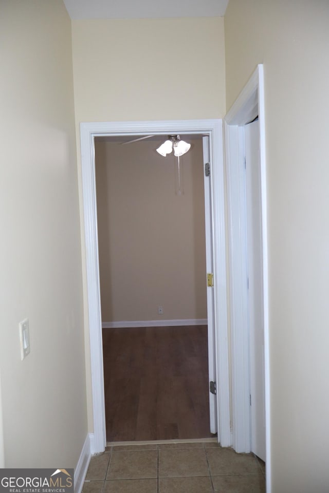 hallway featuring tile patterned floors