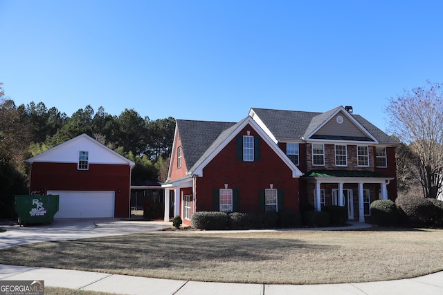 colonial inspired home featuring a garage