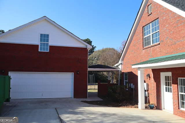 view of property exterior featuring a garage