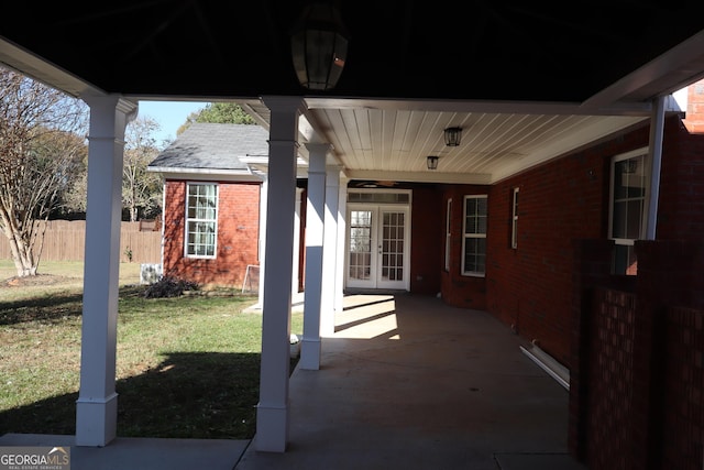 view of patio with french doors and ceiling fan